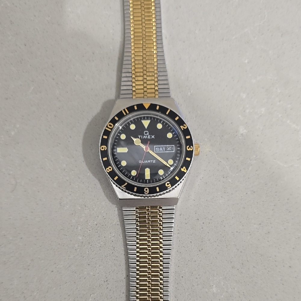 Timex Black and Gold Watch with Luminous Markers